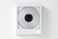 �t�H�g�t���[���̂悤�ȁg�����hCD�v���[���[�uCP1�v�B�W���P�b�g��̎��J�[�h�����[�\